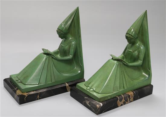 Max Le Verrier. A pair of green patinated spelter bookends, width 6in. height 6.75in.